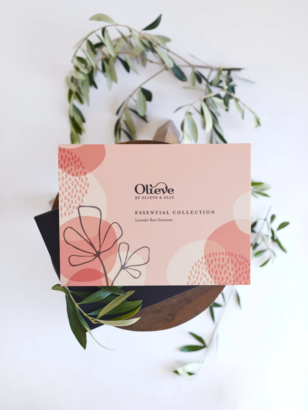 Olieve & Olie Essential Collection Lavender, Rose Geranium & Sweet Orange Gift Set beautifully displayed with handcrafted natural skincare made with Australian olive oil. An elegant gift collection for nourishing hands and body