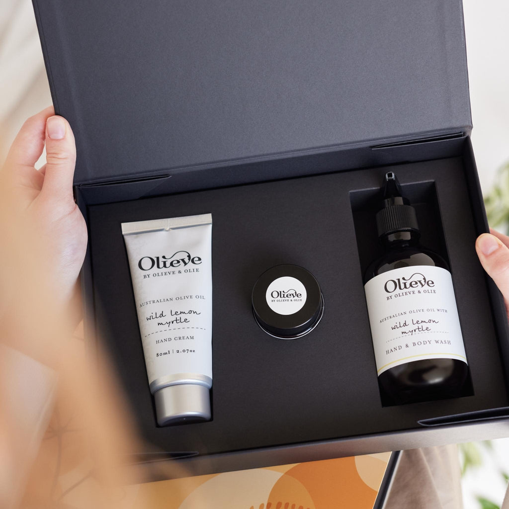 Olieve & Olie Essential Collection Lemon Myrtle Gift Set beautifully presented with natural Australian olive oil skincare. The gift box showcases the handcrafted collection in an elegant lifestyle setting, perfect for gifting or everyday indulgence