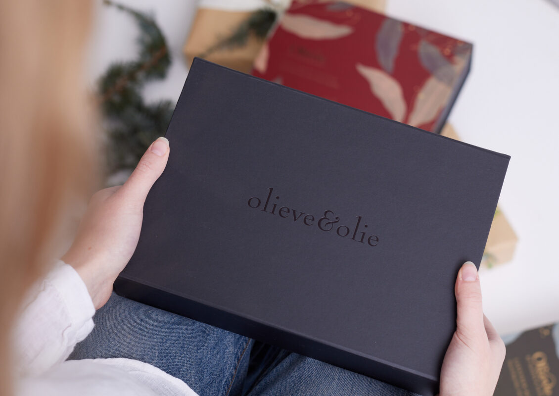 black matte gift box with embellished branding of Olieve & Olie.